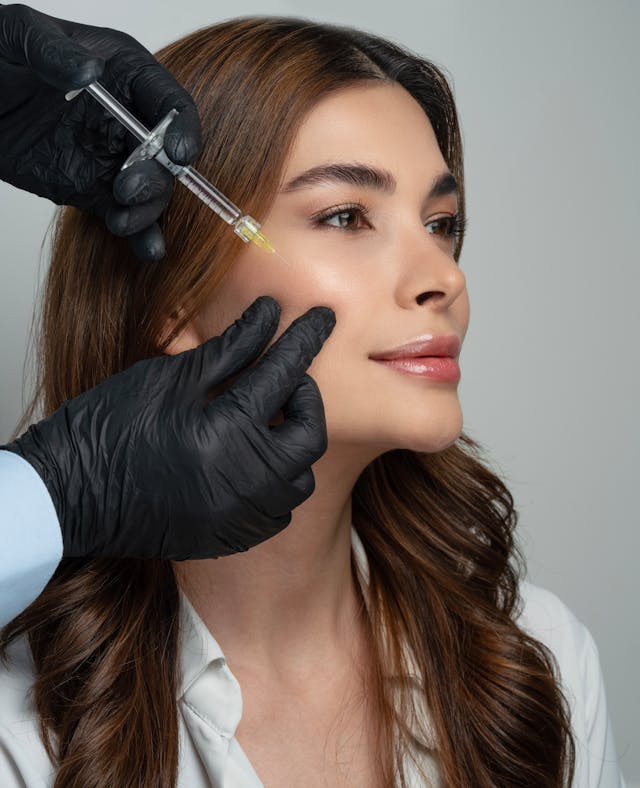 woman gets a Botox injection