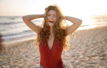 woman smiling at the beach