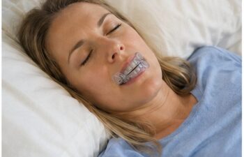 woman sleeping with a nightguard in covington